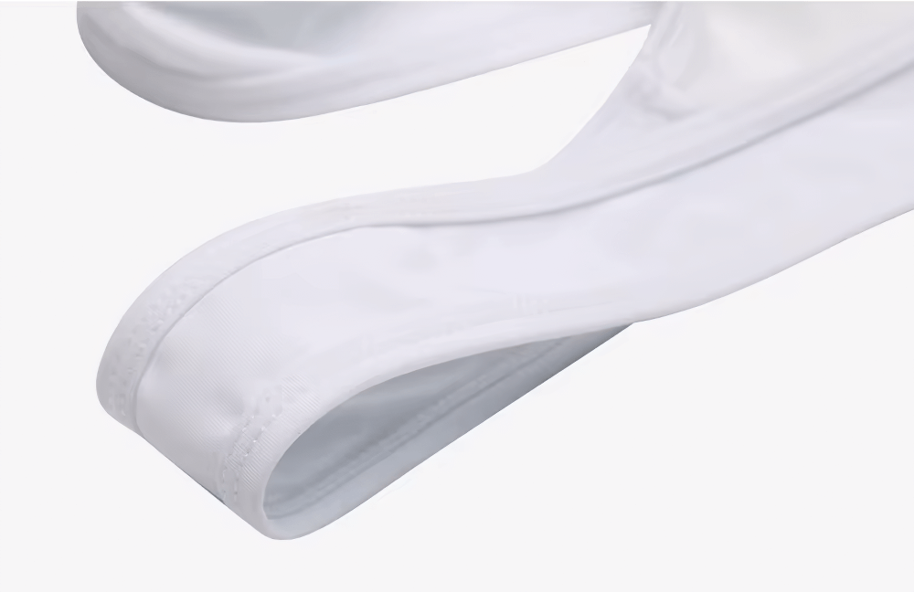 Close-up of white breathable fabric from Quick-Dry Men's Cycling Set, showcasing ergonomic design and superior stitching.