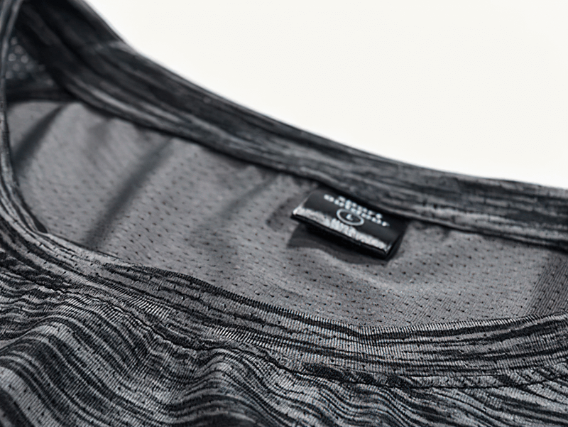 Close-up of black quick-dry round neck running t-shirt for men, highlighting breathable fabric and O-Neck collar design.
