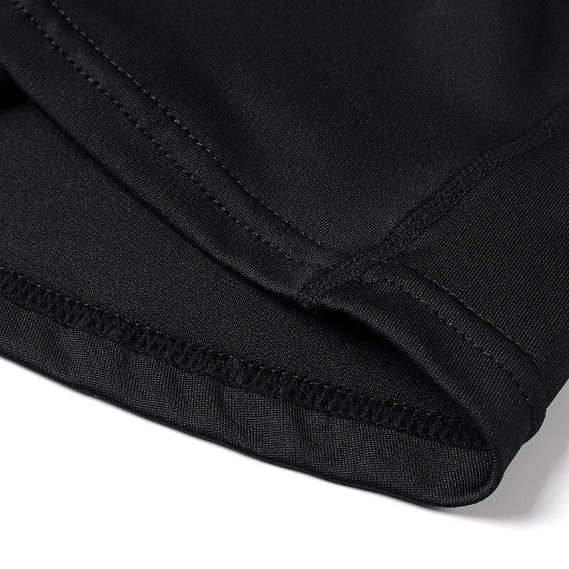 Close-up of the black quick dry sleeveless yoga top fabric showcasing the breathable and lightweight material.