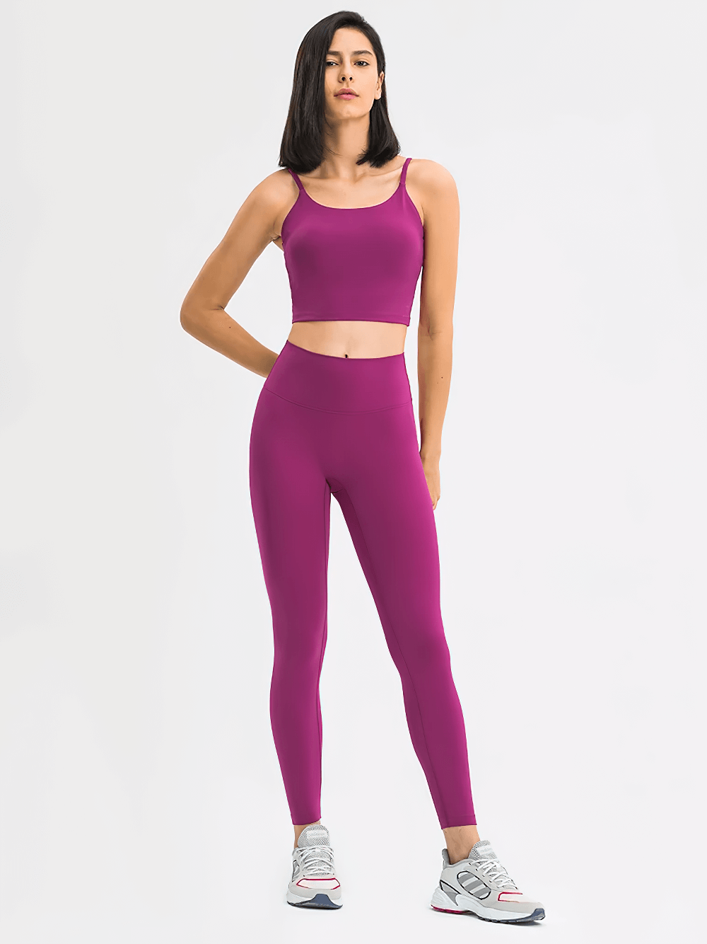 Woman wearing Quick Dry Solid Color Sleeveless Yoga Set SF2144, eco-friendly 2-piece outfit with anti-pilling design, front view.