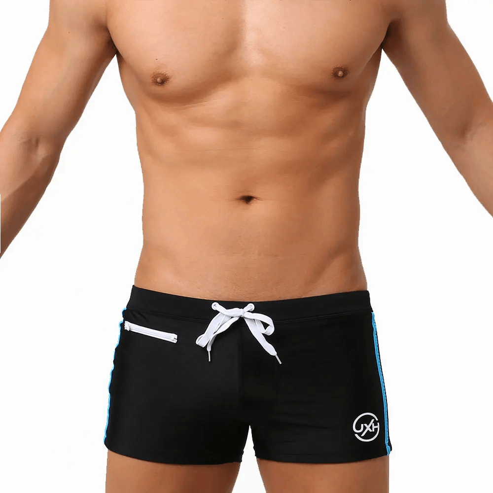 Quick-Dry Swim Trunks with Zipper Pocket - SF4714 on a model showcasing sleek design and adjustable drawstring waist.
