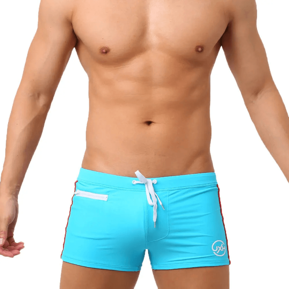 Quick-Dry Swim Trunks with Zipper Pocket - SF4714 in vibrant blue color on a model.