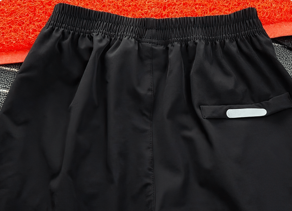 Quick-drying Sports Pants for Boys with Side Pockets - SF3619, featuring elastic waist and durable polyester material.