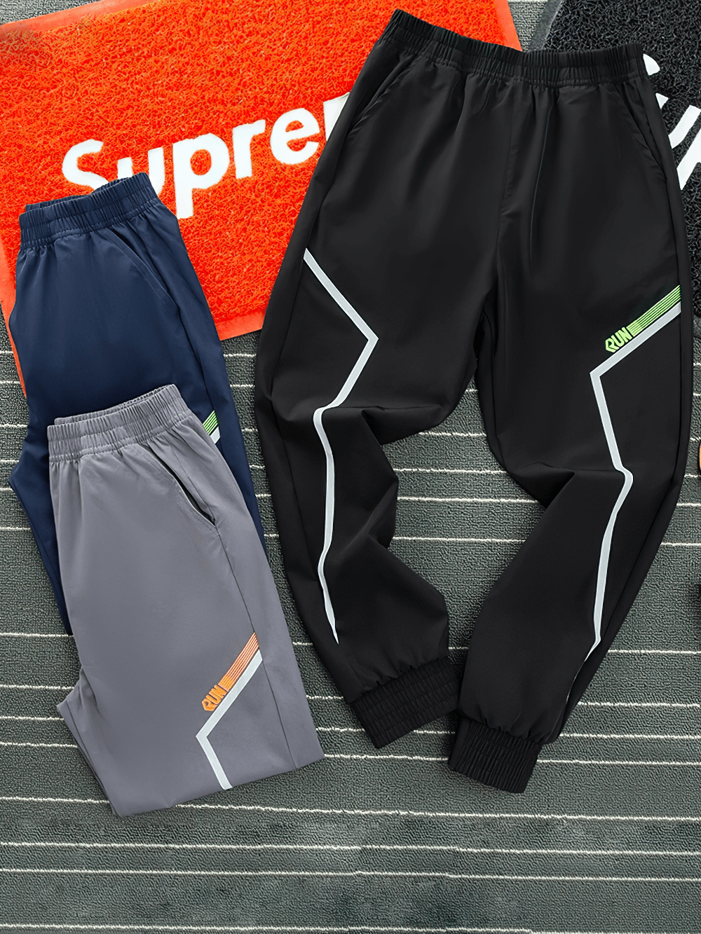 Quick-drying Sports Pants for Boys with Side Pockets - SF3619, elastic waist, durable polyester, available in black, grey, and navy.