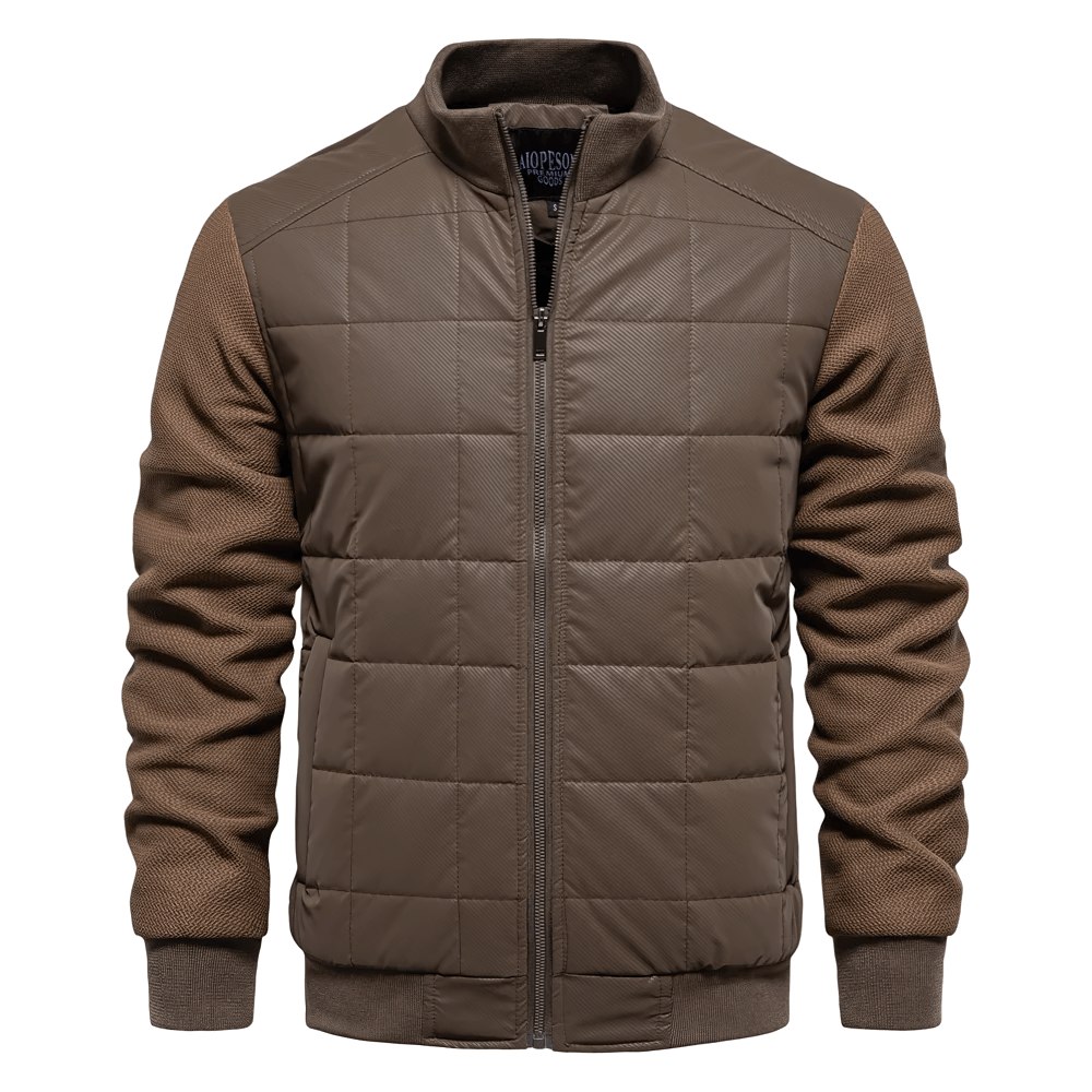 Men's quilted puffer jacket with textured sleeves and zipper, featuring a stand collar and ribbed cuffs, perfect for layering and style.