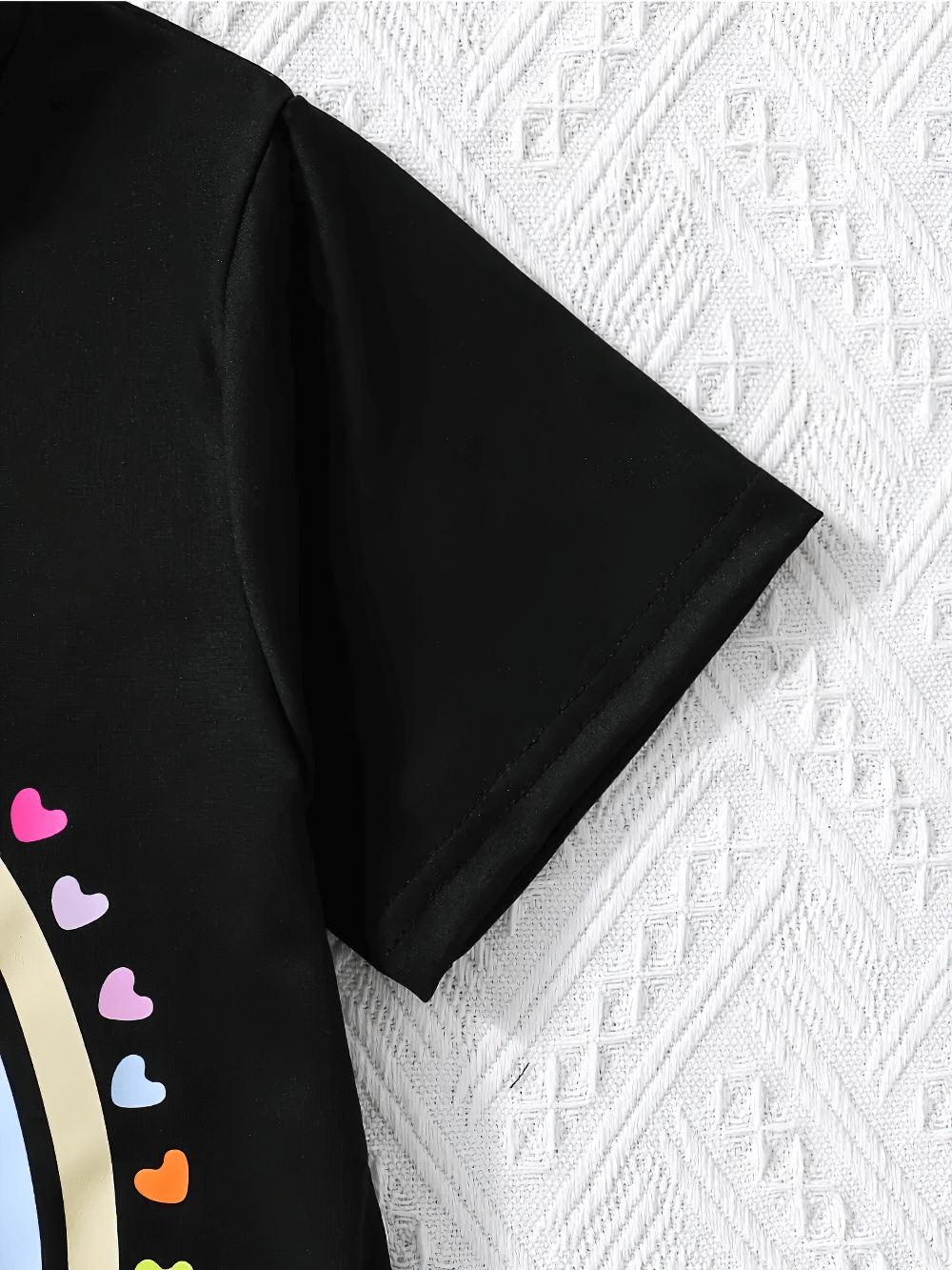 Rainbow Heart Print Short-Sleeved T-Shirt - SF3593 showcasing vibrant heart design on a black fabric background.