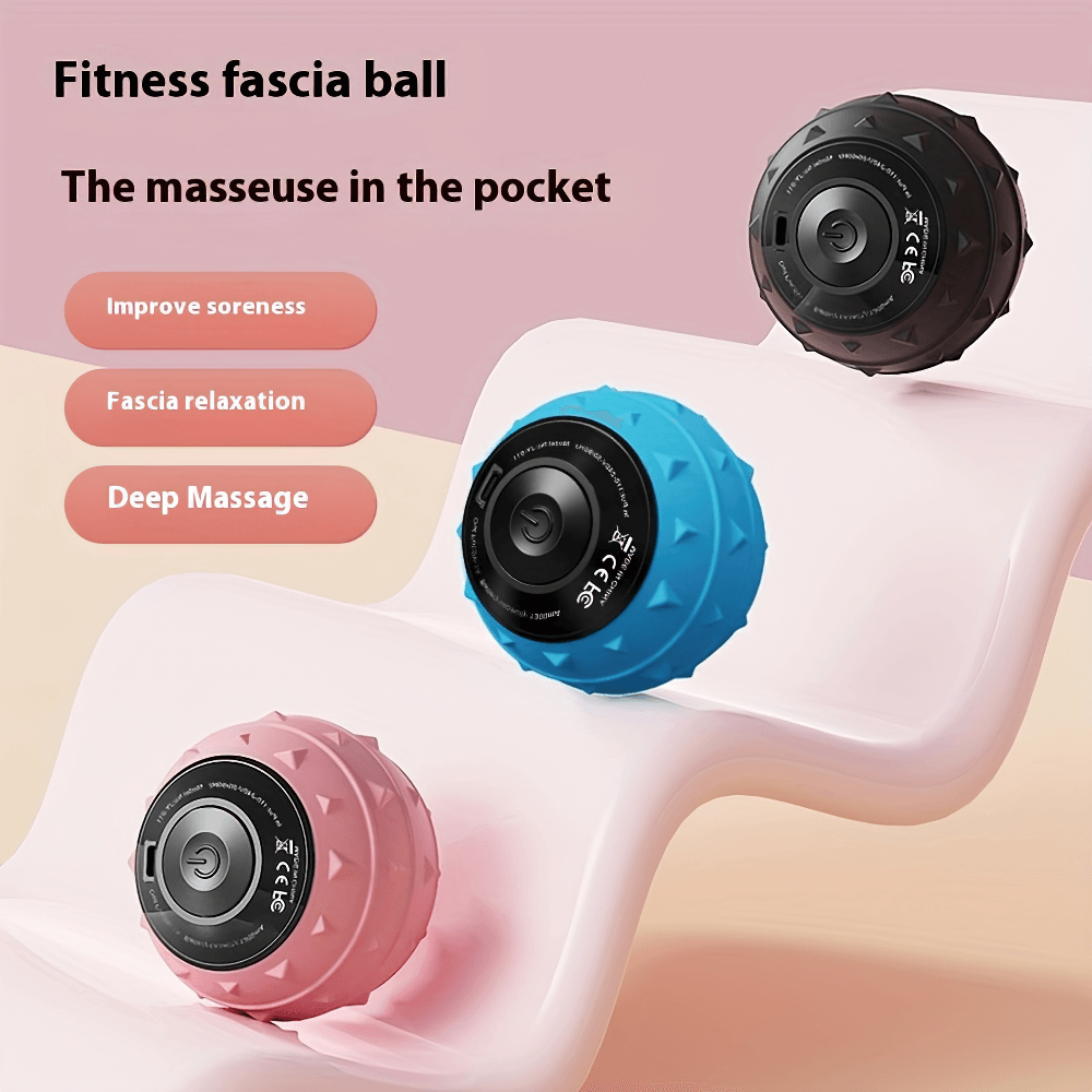 Colorful vibrating fascia massage balls for muscle recovery and deep tissue therapy displayed on a sleek white surface.