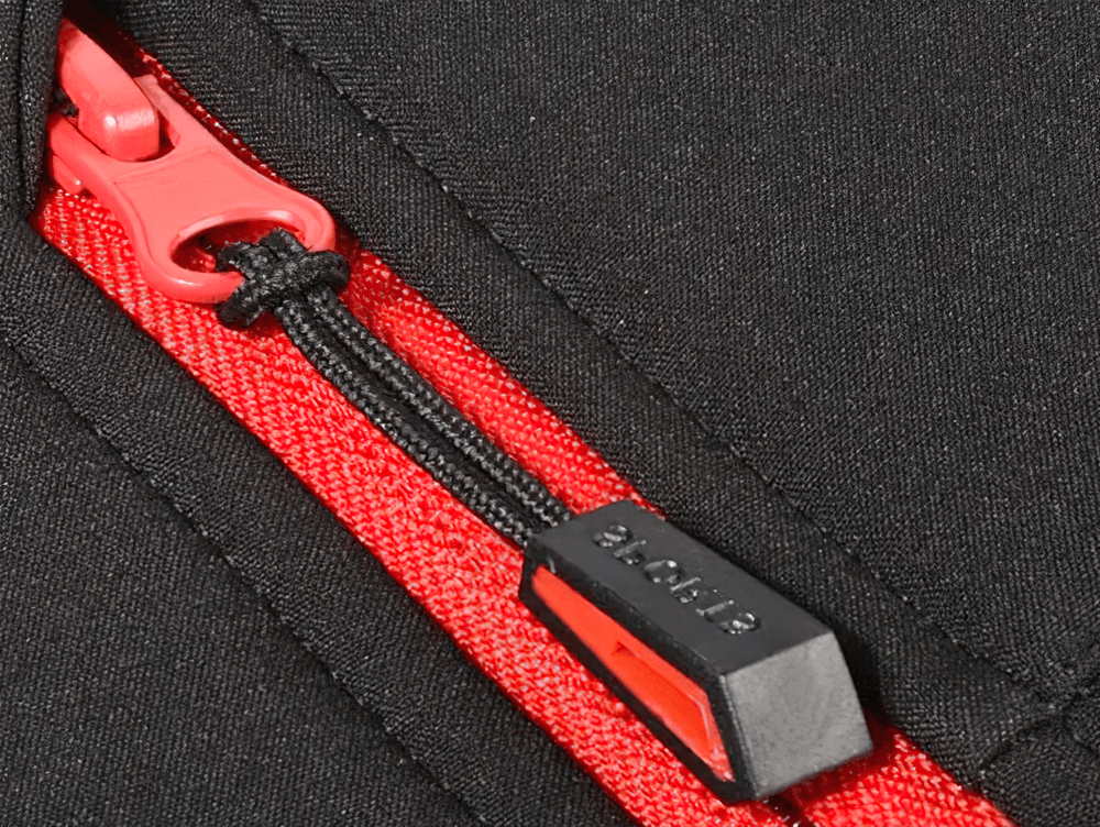 Close-up of SF2639 cycling suit's waterproof zippered pocket with red detailing for secure storage.