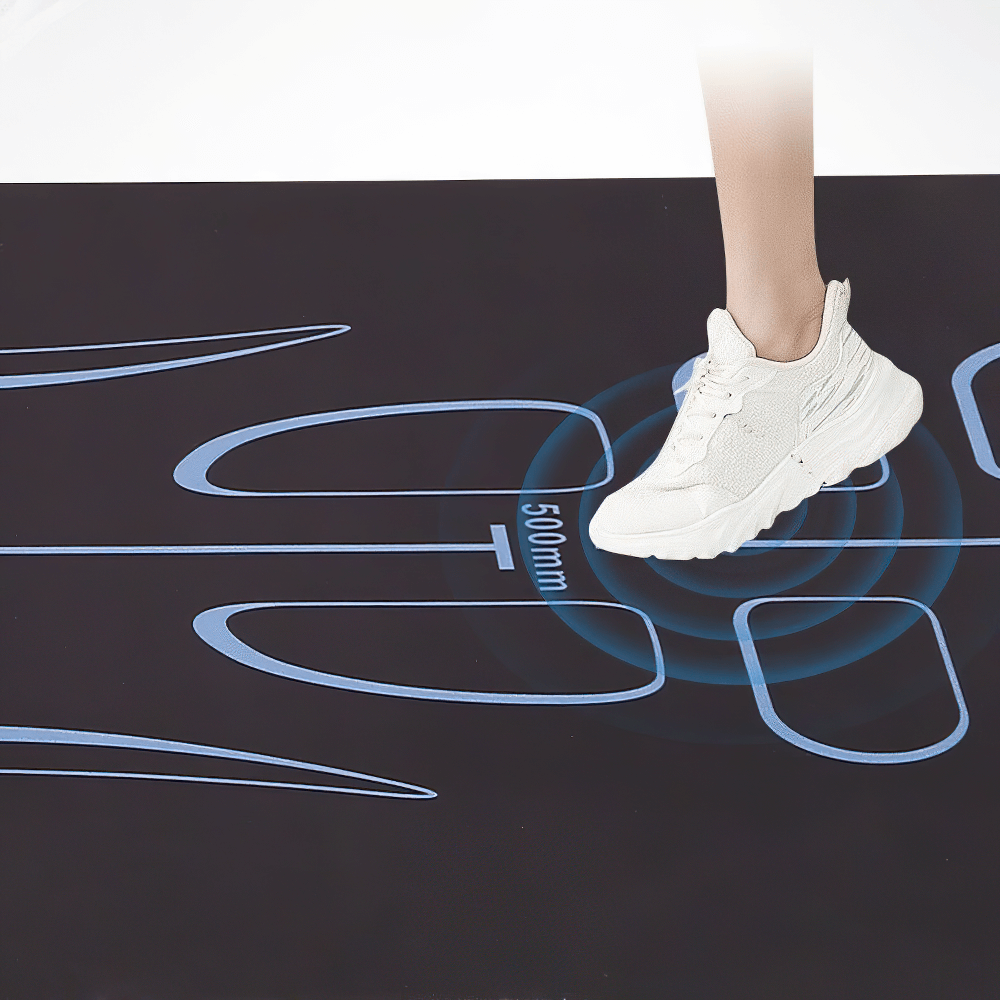 Person stepping on a black silicone non-slip mat with blue ergonomic design for core strength and balance training.