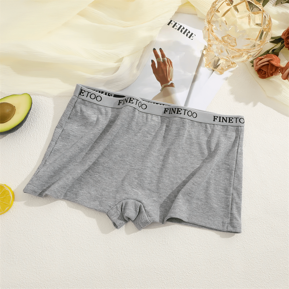 Grey ribbed boyshort panties with elastic waistband on display, featuring soft, stretchy fabric for full coverage.