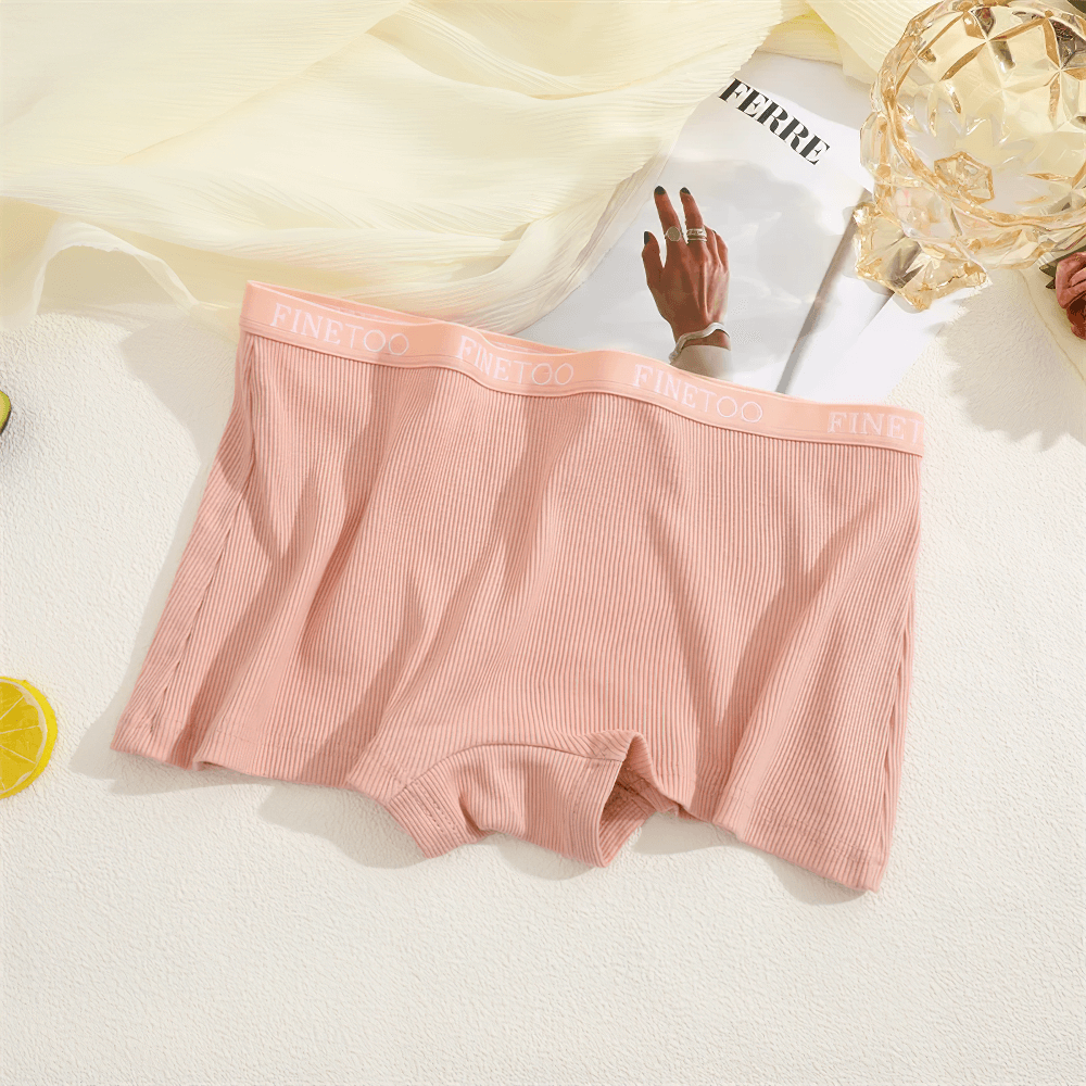 Soft ribbed pink boyshort panties with elastic waistband, offering full coverage and comfort for women. Perfect for everyday essentials.