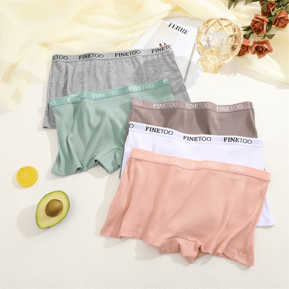 Five pairs of ribbed boyshort panties with elastic waistband in assorted colors on display, perfect for everyday comfort and style.