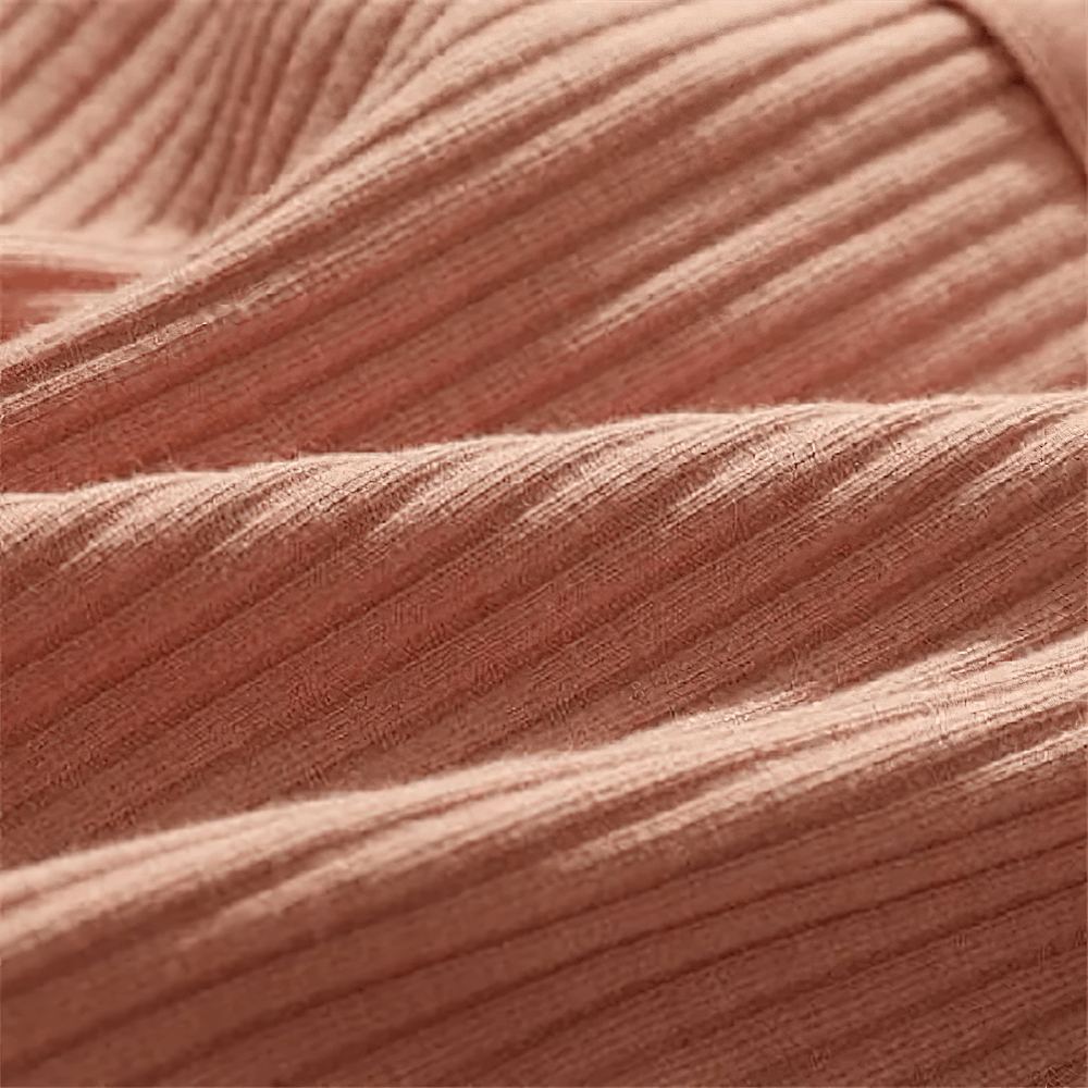 Close-up of the ribbed texture of Ribbed Cotton Bikini Brief Panties for Women - SF4633 in soft pink fabric.