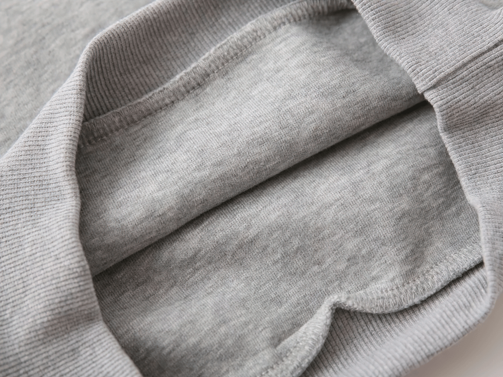 Close-up of inside fabric texture of Round Neck Sweatshirt with Contrasting Sleeves - SF3550 for kids' active play.