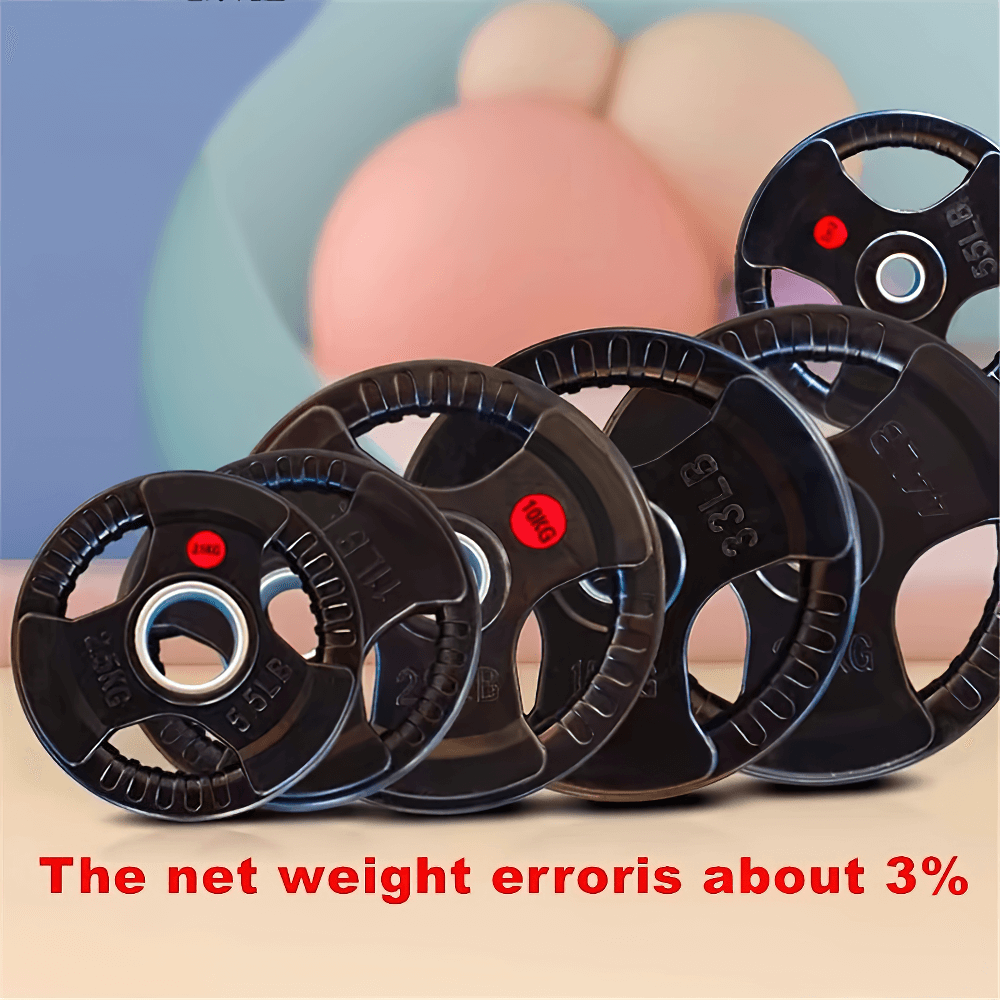 Durable rubber-coated barbell plates in various weights for gym workouts, designed to prevent floor damage and ensure easy handling.