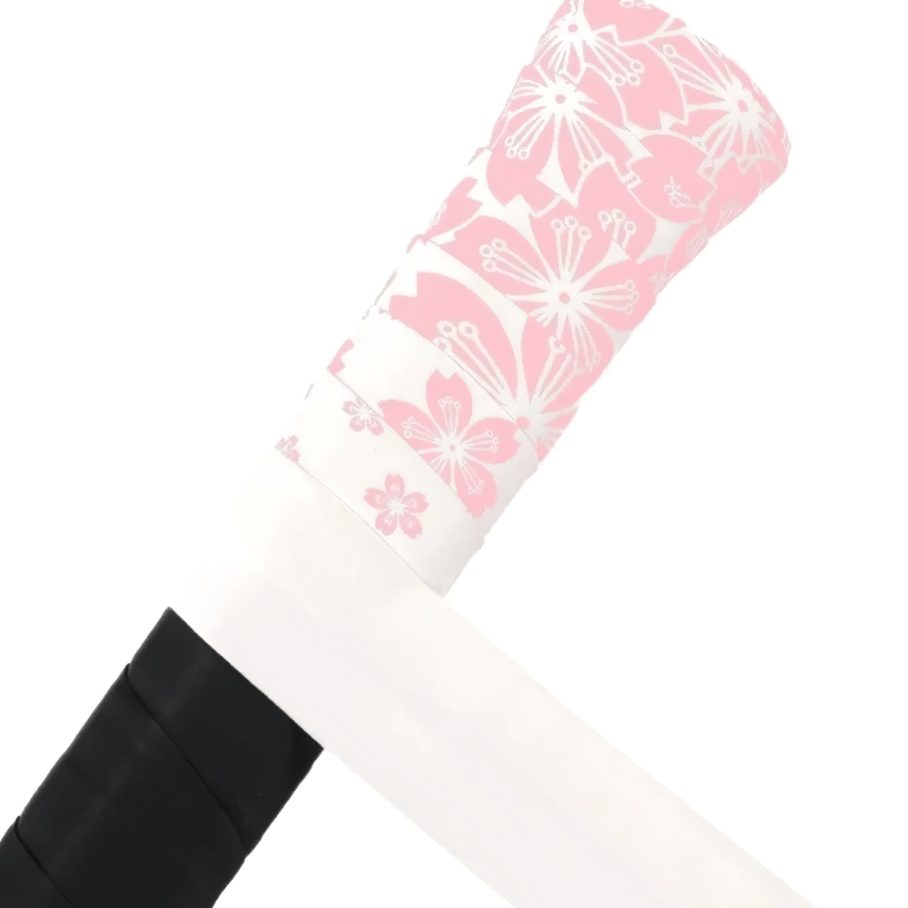 Sakura Print Non-Slip Badminton Grip Tape - SF3462 wrapped on racket handle, featuring pink floral design for better grip and style.