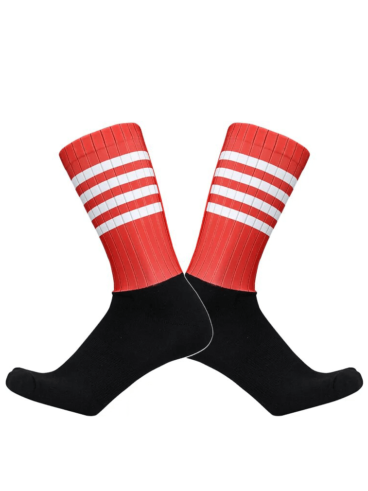 Red and black seamless anti-slip knee-high socks with white strips; ideal for athletes in cycling and other high-intensity sports.