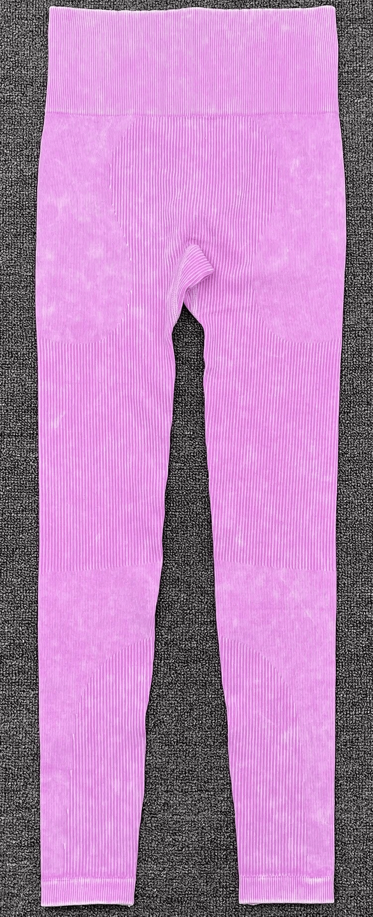 Pink seamless yoga pants with frosted texture, made of breathable nylon and spandex for women. Perfect for active workouts.