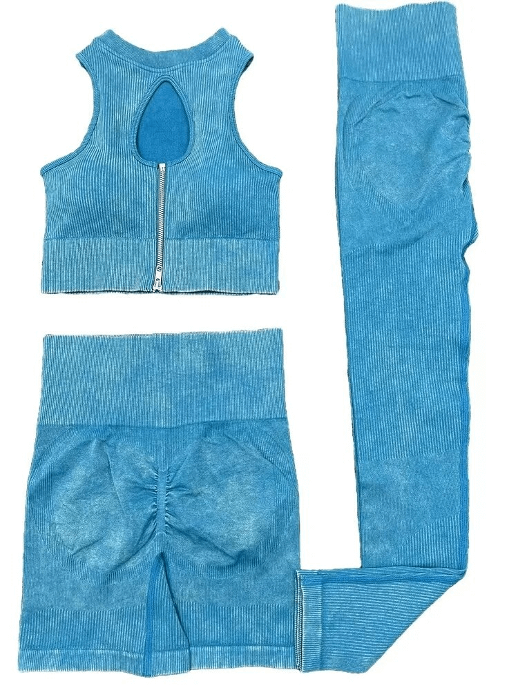 Seamless frosted blue yoga set with zipper crop top, breathable nylon-spandex fabric, stylish and eco-friendly workout wear for women.