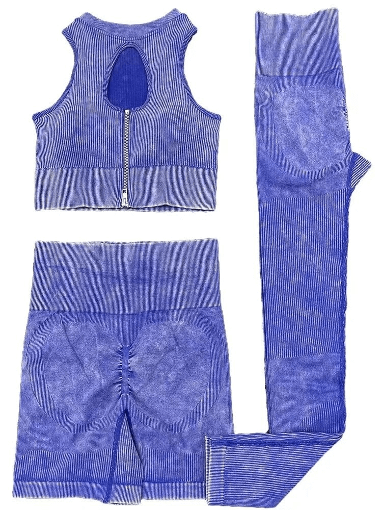 Seamless frosted yoga set with zipper crop top in blue, featuring nylon-spandex blend and stylish design for women. Model SF1732.