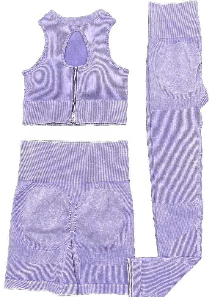 Seamless frosted yoga set in lavender with zipper crop top, breathable nylon-spandex material, ideal for stylish female workouts.