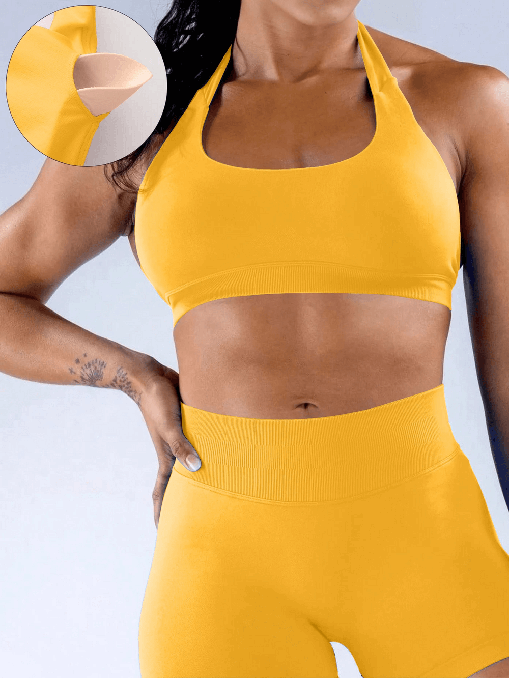 Seamless Halter Neck Sports Bra with Padded Cups - SF4064 in yellow, highlighting open back design and removable pads for yoga and gym wear.