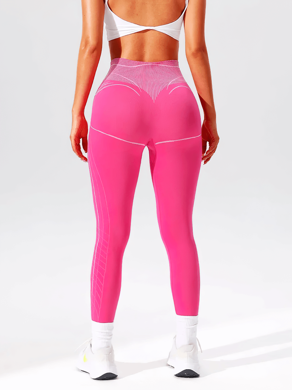 Back view of Seamless High Rise Stripe Fitness Leggings - SF3997 in bright rose red, worn in a fitness pose.