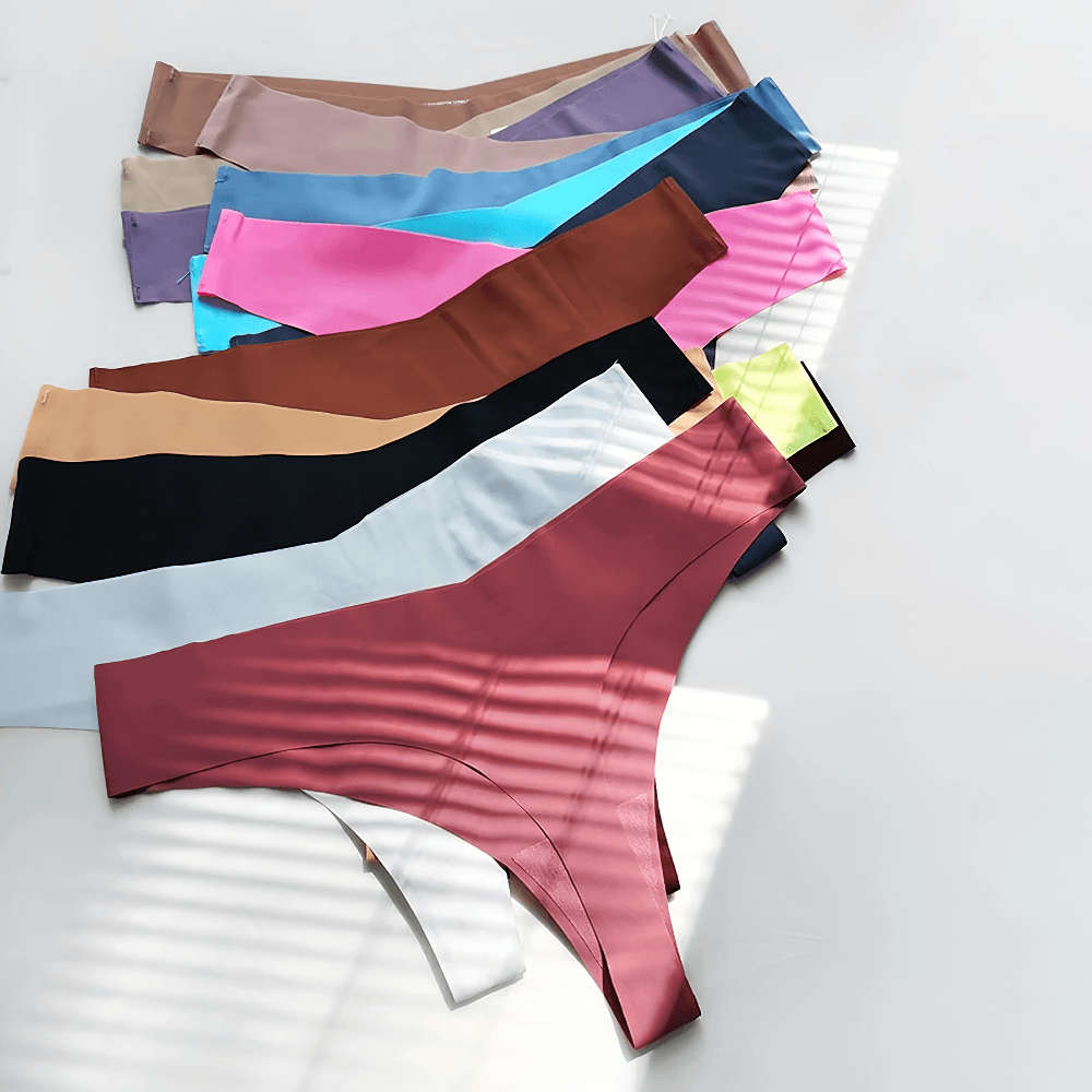 Seamless Ice Silk T Back Thong Panties for Women - SF4661 in various solid colors laid out on a surface.