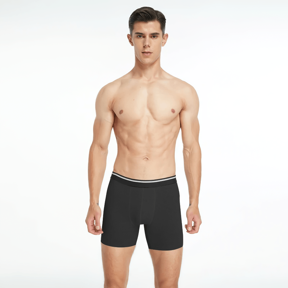 Seamless Men's Long Leg Boxer Briefs in Cotton - SF4706 displayed on a model in black.
