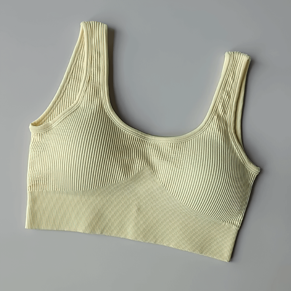 Seamless ribbed sports bra for women, SF2186, made of breathable nylon and spandex, ideal for yoga, running, and pilates workouts.