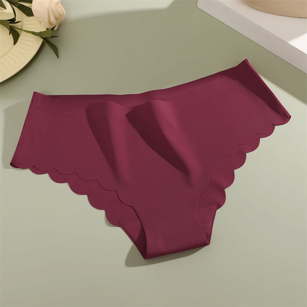 Seamless scalloped edge panties in burgundy with breathable fabric and soft lining, providing a sleek and elegant fit.