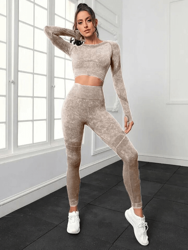 Woman in seamless high waist pants and long sleeve top doing yoga in sunlit room, showcasing flexible quick-dry fabric. SF1692 high-waist set.