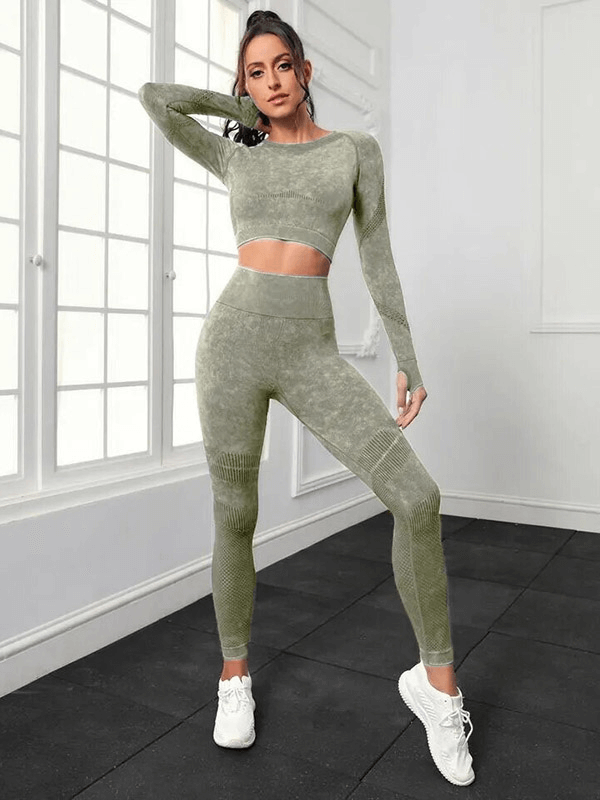 Woman wearing seamless high waist pants and long sleeved top in yoga pose, highlighting eco-friendly, quick-dry, nylon fabric set.