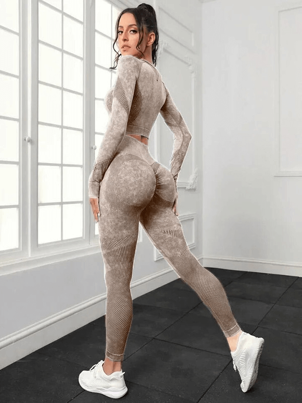 Woman in seamless high waist pants and long-sleeved top, perfect for yoga, showcasing eco-friendly and quick dry features.