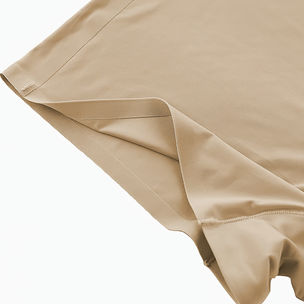 Beige seamless shaping boyshorts with high-waist design for slimming fit and invisible wear under clothing.