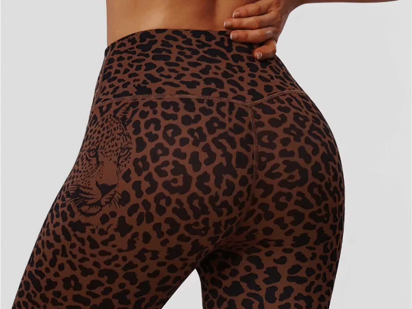 Alt Tag: Seamless Yoga Set with Strappy Bra and Leggings - SF4340 leopard print high-waist leggings close-up, seamless sculpting fit