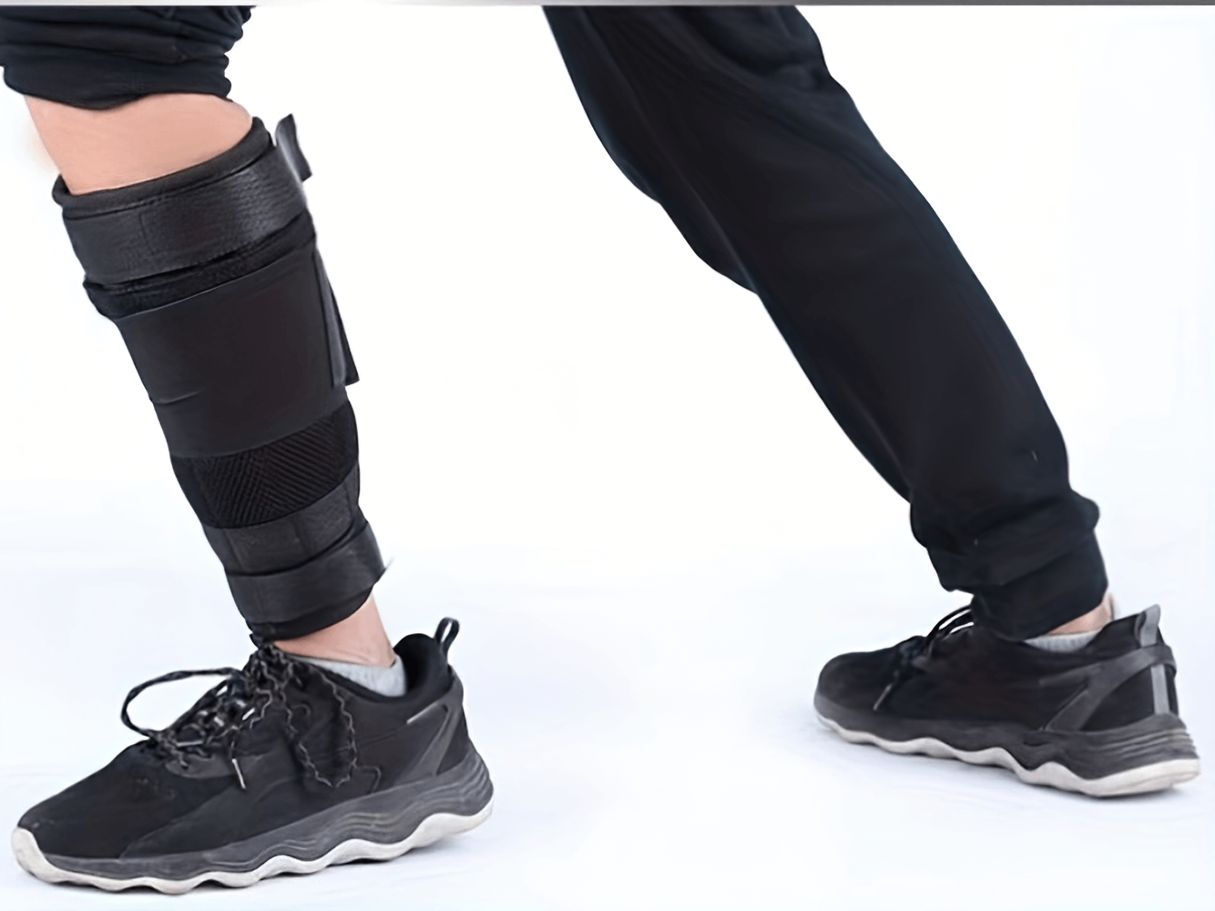 Man wearing Secure Adjustable 5kg Ankle Weights Set SF2920 for training efficiency and exercise impact.