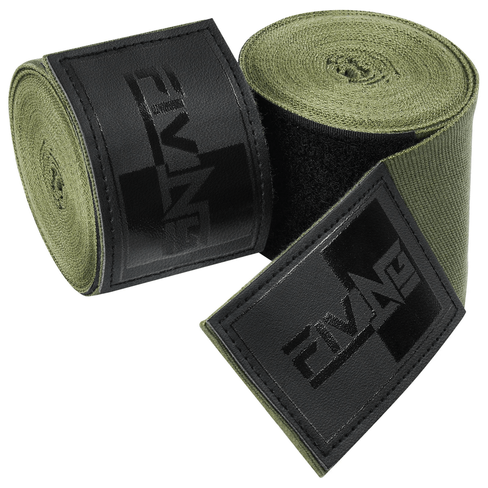 Green and black martial arts hand wraps with thumb loop for boxing and MMA, 4.5m long, featuring hook-and-loop closure for secure fit.