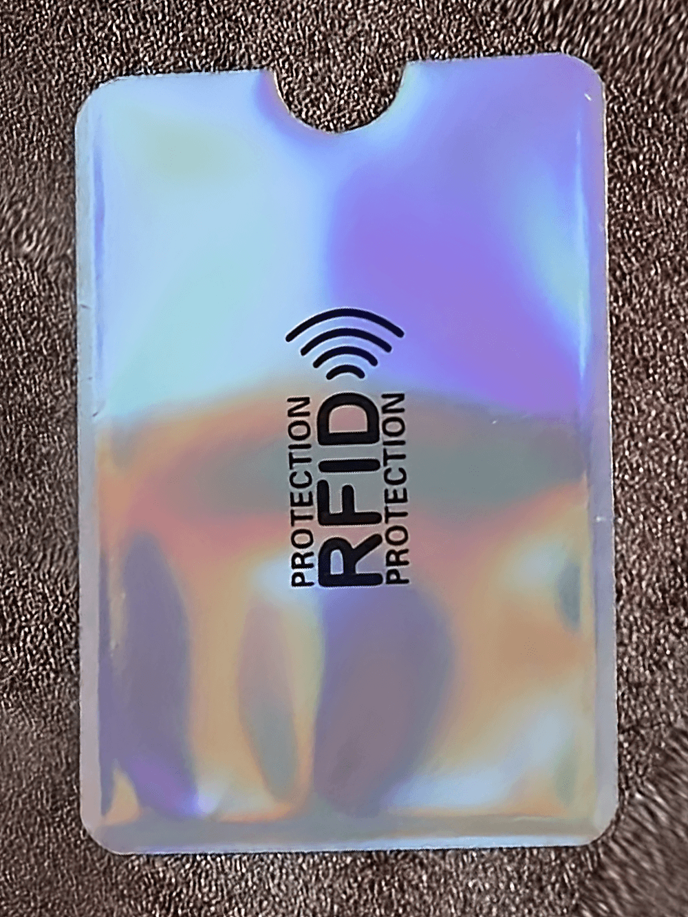 Holographic RFID blocking card sleeve with text 'Protection' for secure credit card safety.