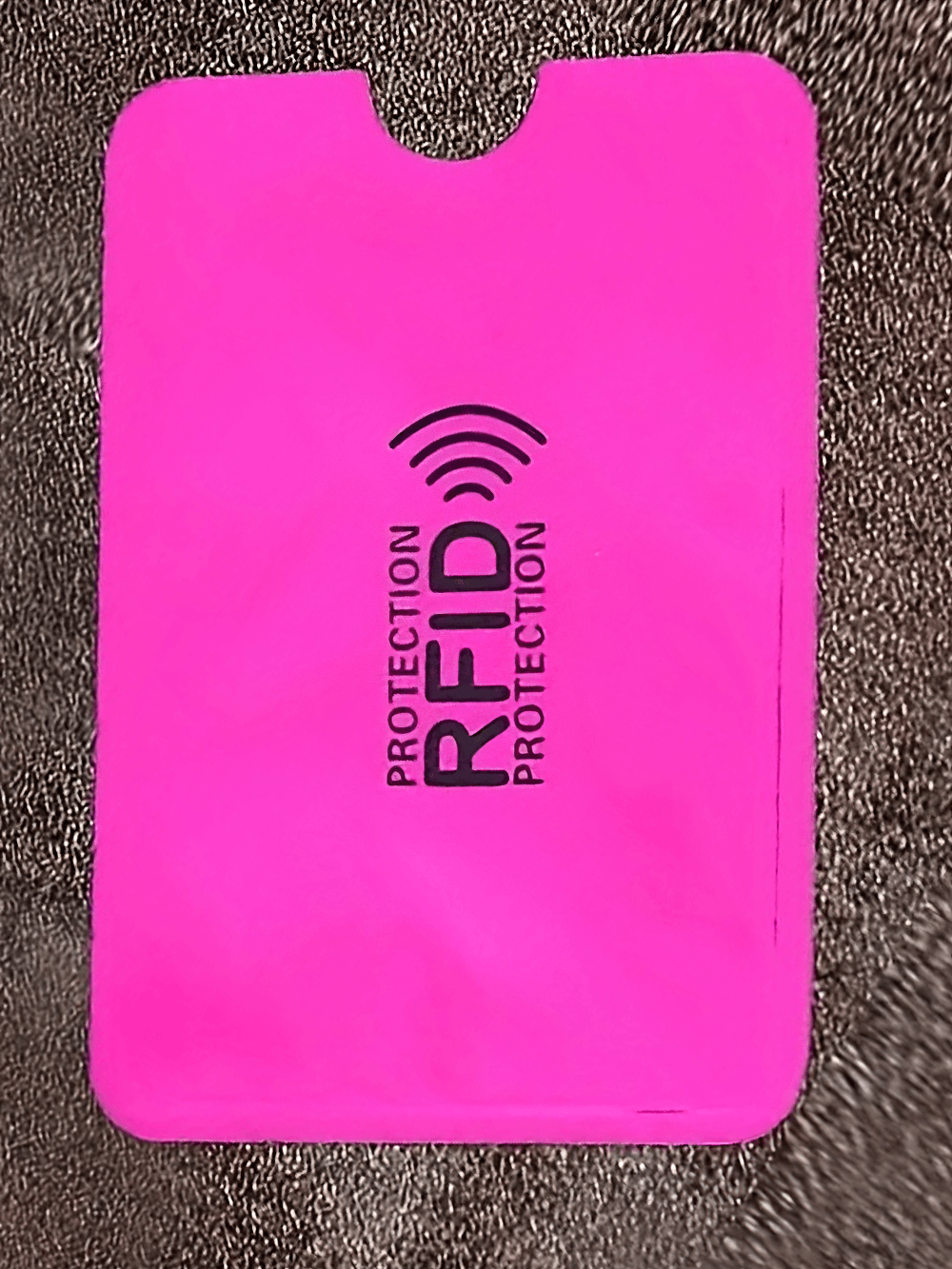 Ultrathin pink RFID blocking card sleeve for secure wallet protection against card scanning.