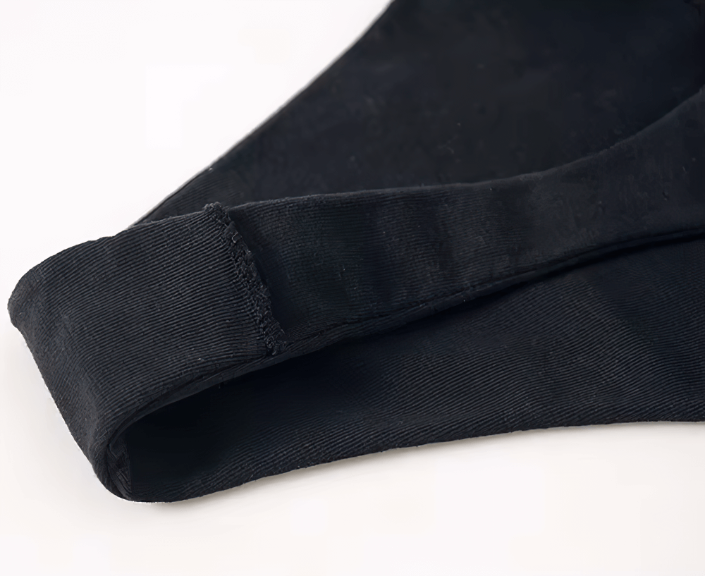 Close-up of a black cotton low-rise thong bikini, showcasing its seamless design and T-back style for a stylish and sexy look for women.