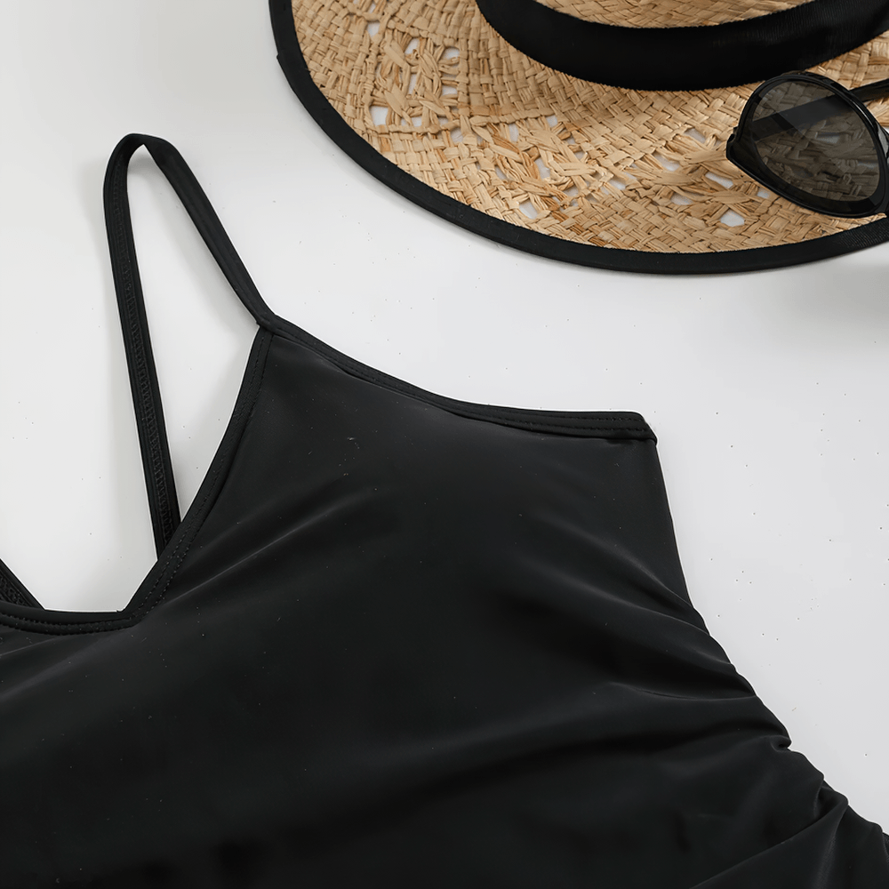 Sexy Cutout One Piece Swimsuit with Open Back - SF4546 styled with a straw hat and sunglasses for beach fun.