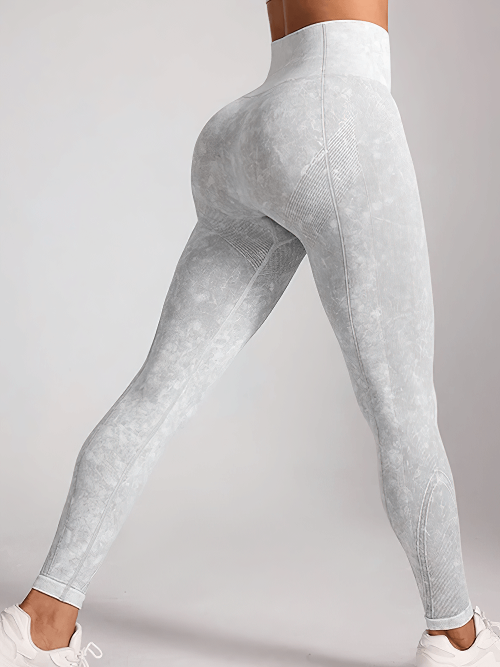 Woman wearing Sexy Hip Lifting Workout Leggings for Gym - SF4108 in gray, showcasing high waist and seamless design.