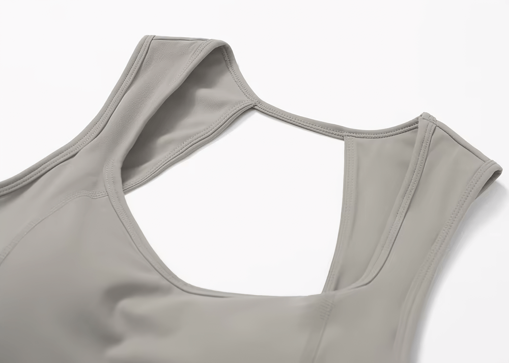 Open back shockproof sports tank top for women in gray, made of nylon and spandex, ideal for running and gym sessions, SF2445.