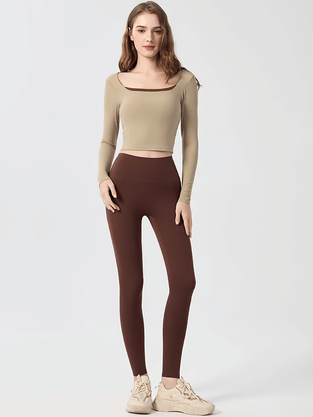 Model wearing the Sexy Open Back Sports Women Long Sleeve Top - SF4142 for yoga and fitness, showcasing breathable and quick-drying fabric.