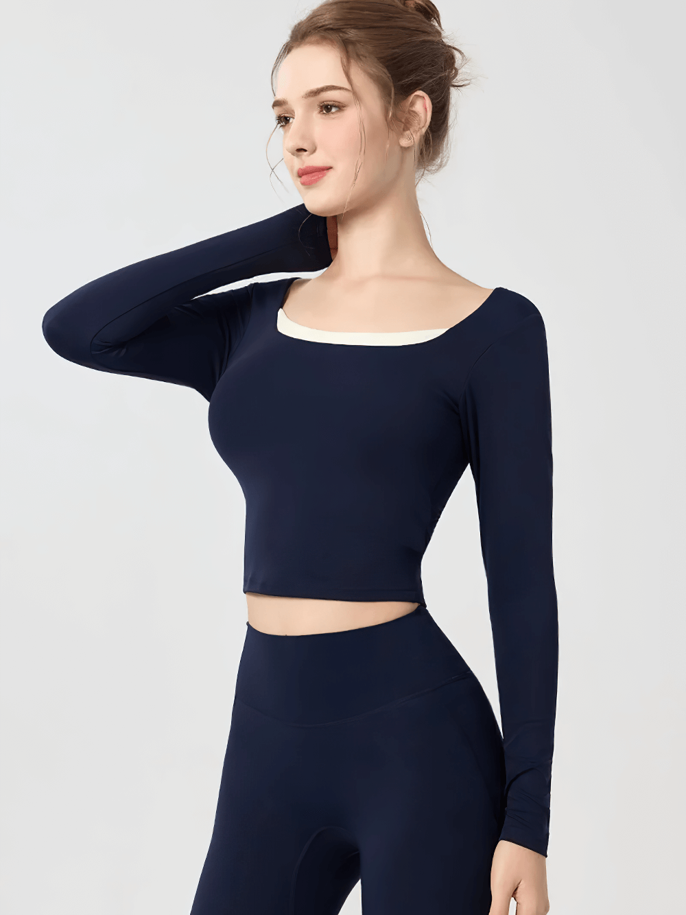 Sexy Open Back Sports Women Long Sleeve Top - SF4142 in stylish navy for yoga and fitness with trendy back cutout design.
