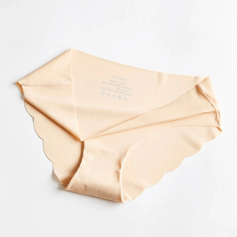 Seamless ice silk panties with a scalloped edge in nude color, offering a smooth, comfortable fit for women. Style SF2182.