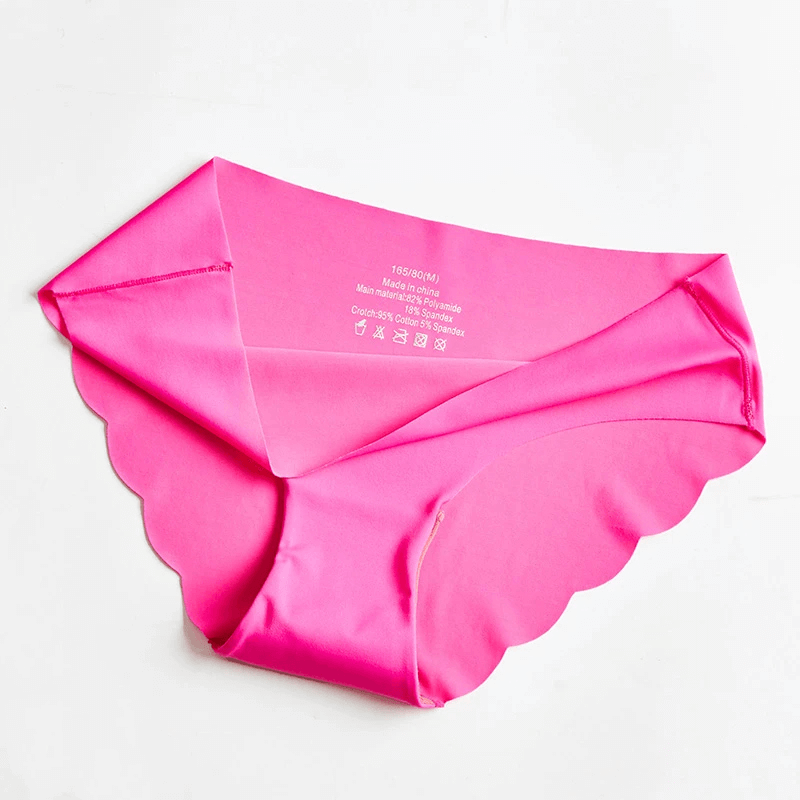 Vibrant pink seamless women's panties with scalloped edges, designed for a smooth fit and invisible look. Soft, breathable, and comfy.