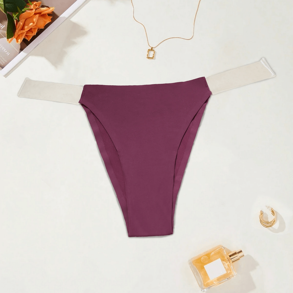 Sexy women's thong with clear side straps, sleek design in solid color for seamless wear. Perfect for subtle style in women's underwear.