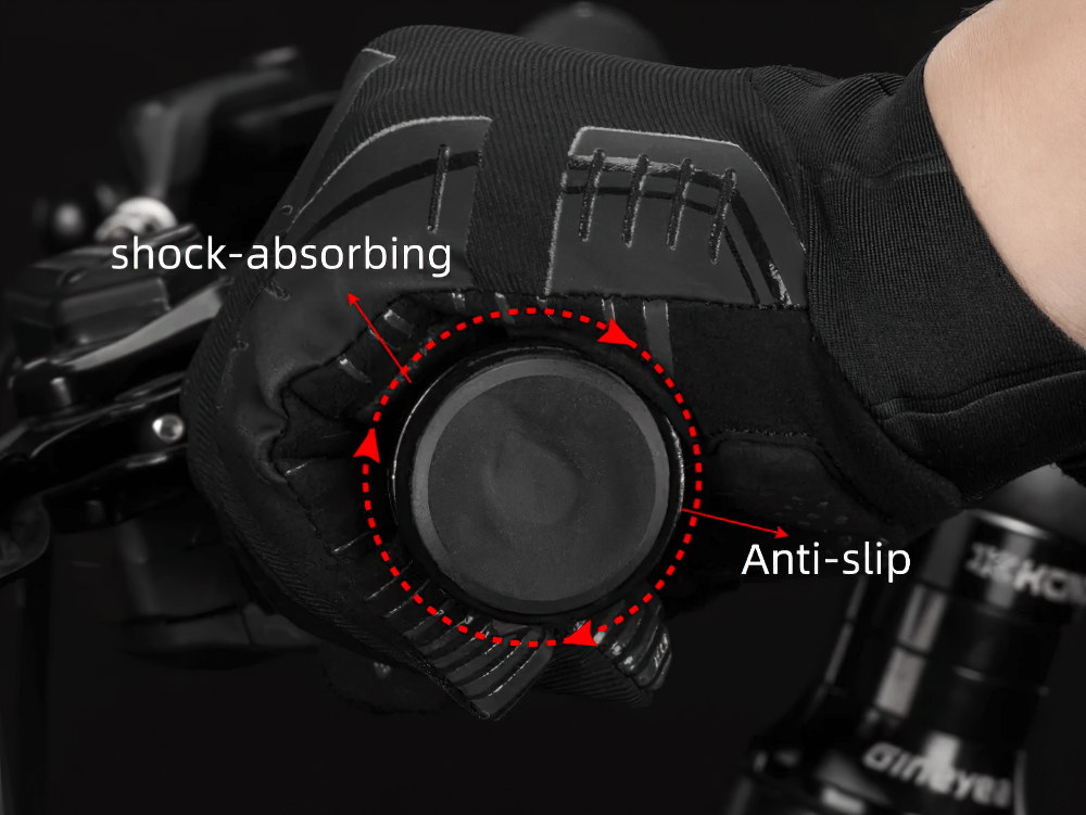 Close-up of black shockproof cycling glove with silicone grip, showing anti-slip palm design and elastic wrist support.